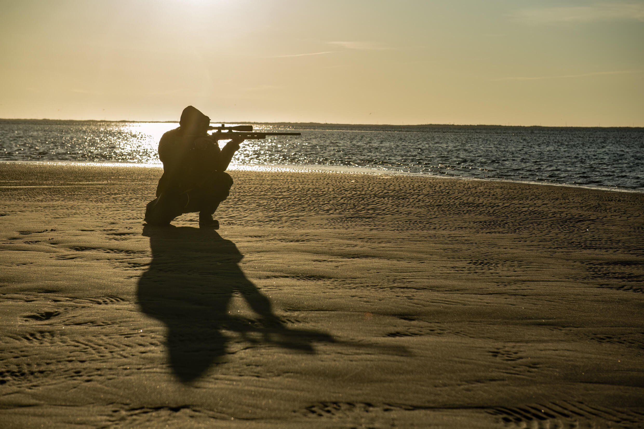 Seal hunter Yoanis Menge waits for his prey -- the controversial practice is legal in Canada, and hunters say they hope the public can see it in a new light